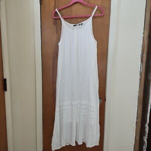 Mlle Gabrielle Ivory Sleeveless Dress With Shimmer Silver Lines.    Size L